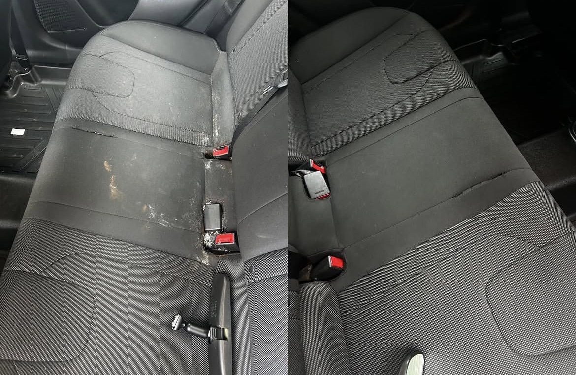 Black cloth rear bench with dried spills around the seatbelt buckles before, clean uniform fabric after